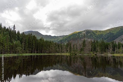 Smreczynski Pond  Smreczy  ski staw  lake in mountains gloomy scenery  tatra mountains landscape