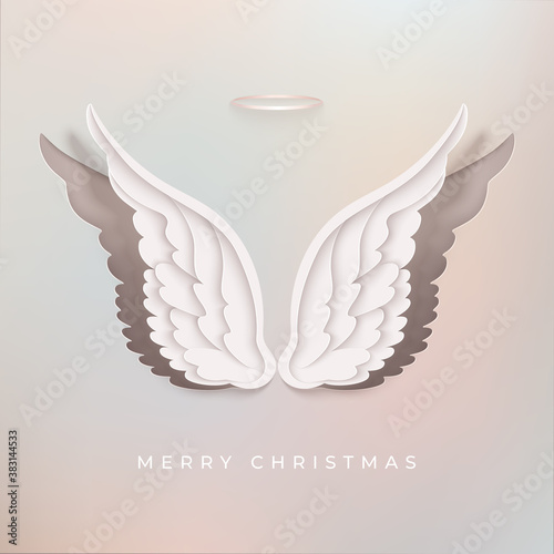 Merry Christmas greeting card with paper cut angel wings