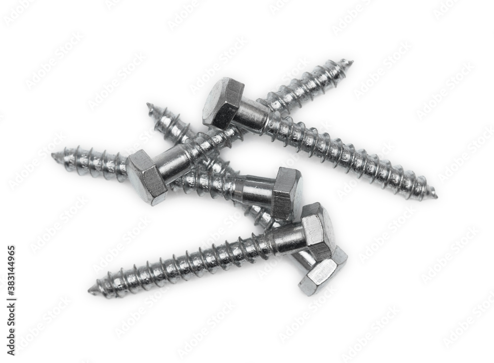 Random pile of hexagonal threaded steel bolts or screws isolated on white background. Metric Hexagonal Head Coach Screw Bright Zinc Plated. Random pile of hexagonal threaded steel bolts or screws isolated on white background. Metric Hexagonal Head Coach Screw Bright Zinc Plated.