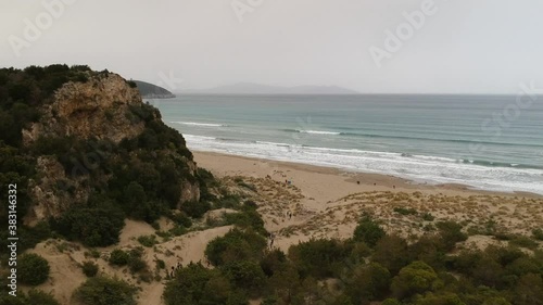 Stormy italian coast with big Rock