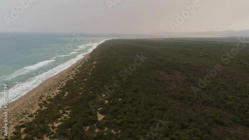 Flight over stormy beach