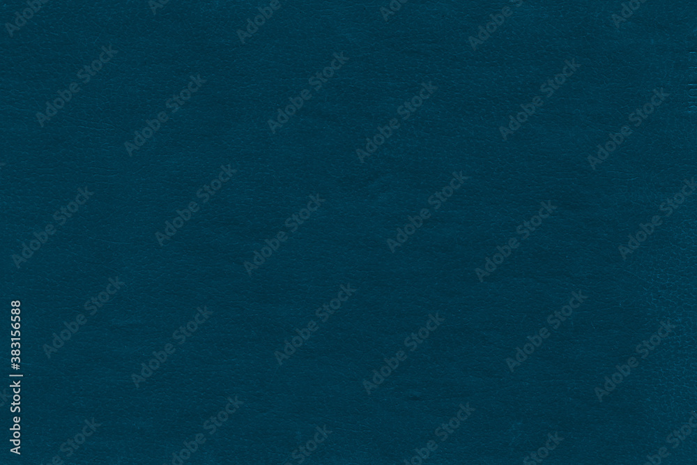 Vintage and old looking paper background. Colored blue retro book cover. Ancient book page.