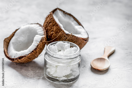 cosmetic concept with fresh coconuts on white table background