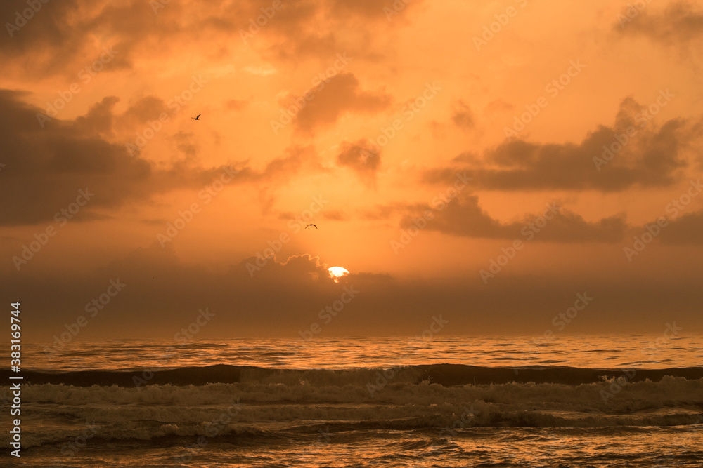 Sunrise on a foggy beach on Amelia Island, Florida
