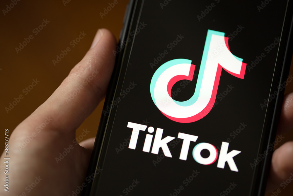 WENZHOU, CHINA - October 6, 2020: Smart phone with TIK TOK logo, which ...