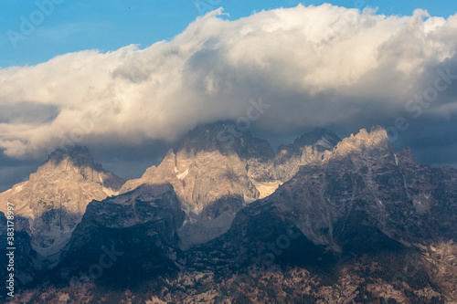 Landscape view of clouds passing over the Grand Teton mountain range in Grand Teton National Park (Wyoming).
