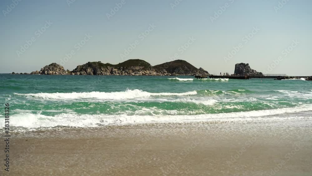 Seascape with beautiful sandy beaches and rocks on the horizon. Treasure, Russia Seascape with beautiful sandy beaches and rocks on the horizon. Treasure, Russia