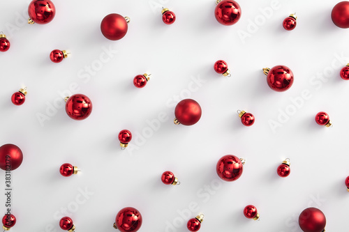 Red christmas ball over white