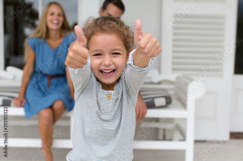 Photography Portrait enthusiastic girl gesturing thumbs up