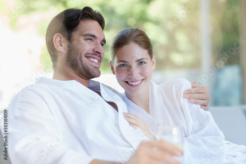 Εκτύπωση καμβά Portrait happy young couple in bathrobes relaxing in spa
