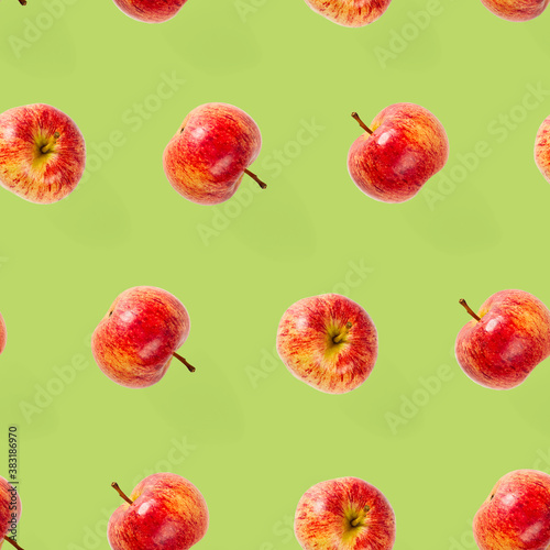 Fototapeta Naklejka Na Ścianę i Meble -  Seamless pattern with ripe apples. Tropical fruit abstract background. Apple seamless pattern on green background.