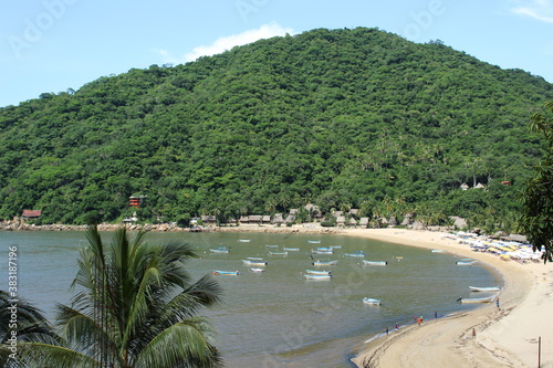 the beach with the mountain green