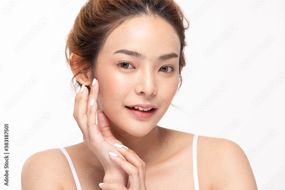 Beautiful Asian young woman touching soft cheek smile with clean fresh skin Happiness and cheerful with positive emotional,isolated on white background,Beauty Cosmetics and Facial treatment Concept