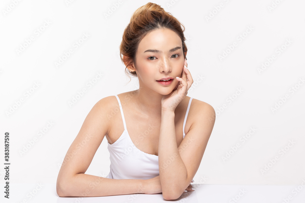 Beautiful Asian young woman touching soft cheek smile with clean fresh skin Happiness and cheerful with positive emotional,isolated on white background,Beauty Cosmetics and Facial treatment Concept Beautiful Asian young woman touching soft cheek smile with clean fresh skin Happiness and cheerful with positive emotional,isolated on white background,Beauty Cosmetics and Facial treatment Concept