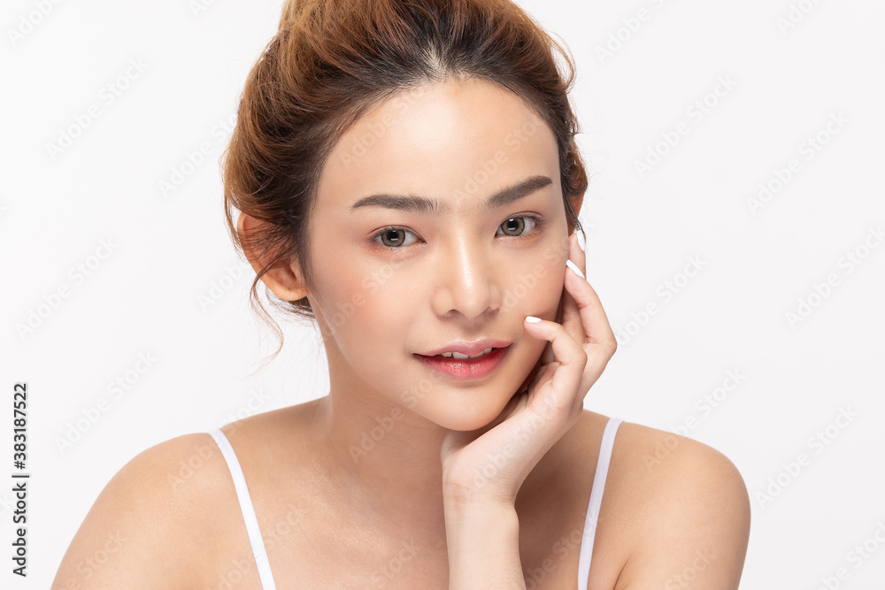 Beautiful Asian young woman touching soft cheek smile with clean fresh skin Happiness and cheerful with positive emotional,isolated on white background,Beauty Cosmetics and Facial treatment Concept Beautiful Asian young woman touching soft cheek smile with clean fresh skin Happiness and cheerful with positive emotional,isolated on white background,Beauty Cosmetics and Facial treatment Concept