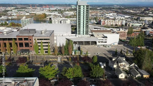 Aerial / drone footage of Courtyard by Marriott Tacoma Downtown, waterfront by Puget Sound, a large city near Seattle in Western Washington, Pacific Northwest, an economic center of Pierce County photo