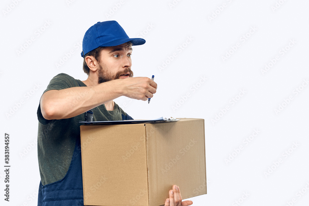 Working male courier with box in hand documents delivery service light background Working male courier with box in hand documents delivery service light background