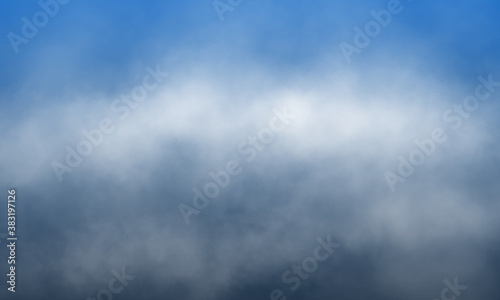 Abstract white smoke on brilliant blue color background