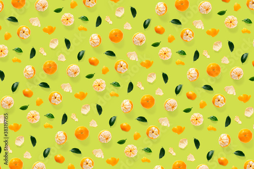 Fototapeta Naklejka Na Ścianę i Meble -  Isolated tangerine citrus collection background with leaves. Tangerines or mandarin orange fruits on green background. mandarine orange background.