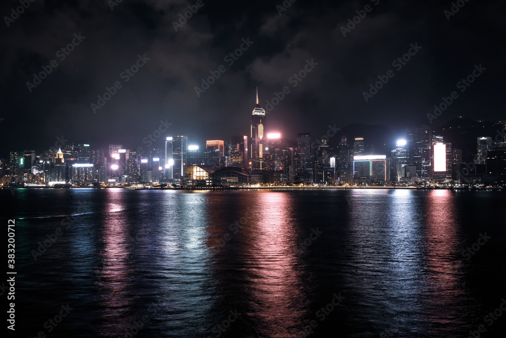 Hong Kong Skyline by night photography. This photo shows Hong Kong Island side in the early night time when all the lights are on.