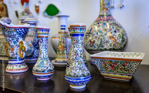 Traditional Portuguese ornate pottery with azulejo design on display at a souvenir shop in Porto, Portugal