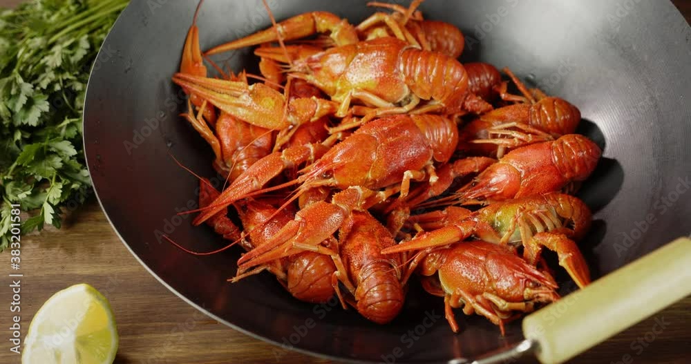 Boiled crayfish in the bowl slowly rotate. Boiled crayfish in the bowl slowly rotate.