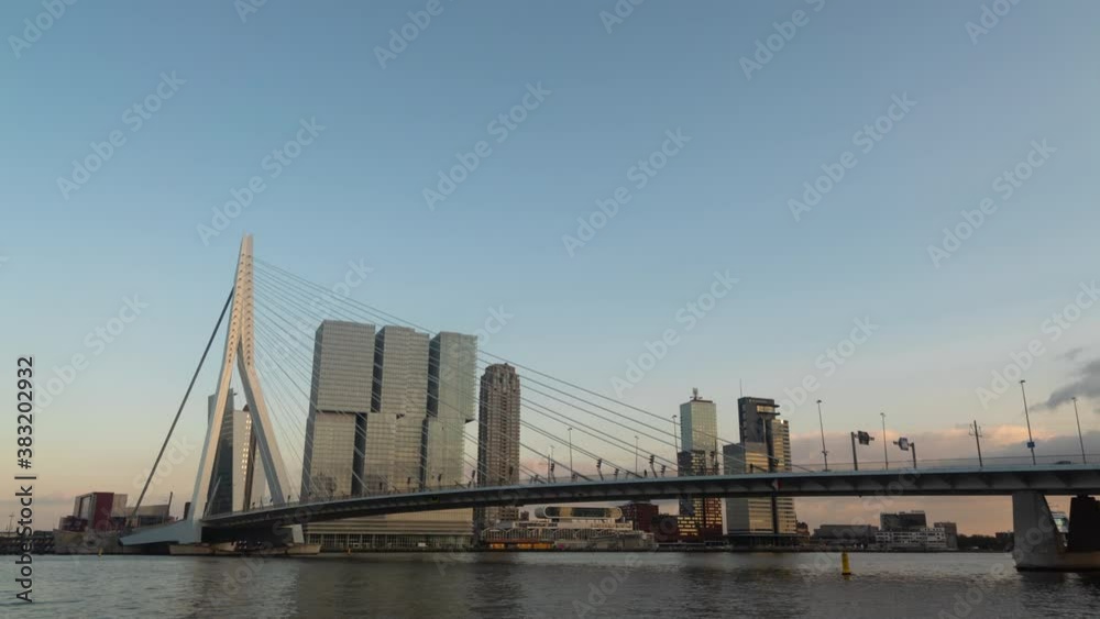 Rotterdam, Netherlands - Cityscape Skyline and Erasmusbrug Erasmus Bridge Crosses The Nieuwe Maas River Time Lapse Rotterdam, Netherlands - Cityscape Skyline and Erasmusbrug Erasmus Bridge Crosses The Nieuwe Maas River Time Lapse