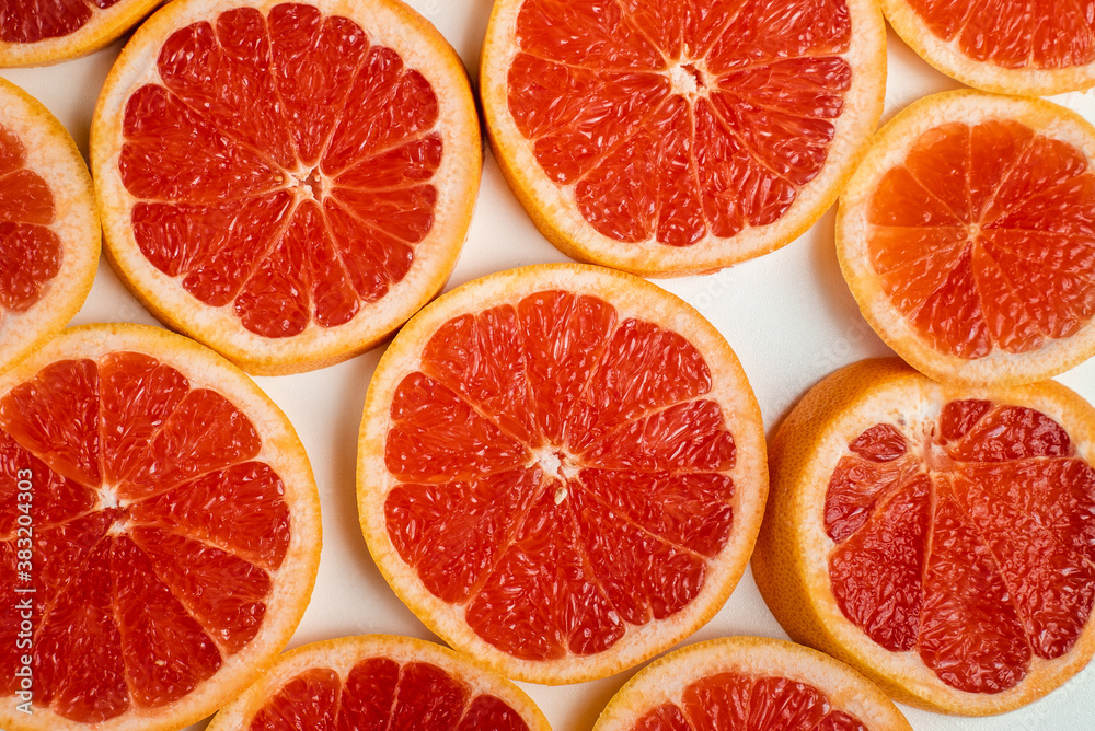 Background of slices of grapefruit close up Background of slices of grapefruit close up