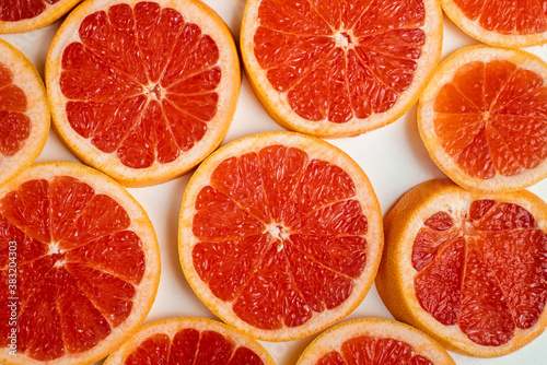 Background of slices of grapefruit close up