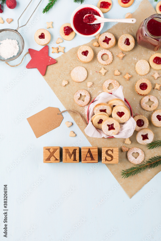 Fototapeta premium Traditional Austrian christmas cookies - Linzer biscuits filled with raspberry jam.