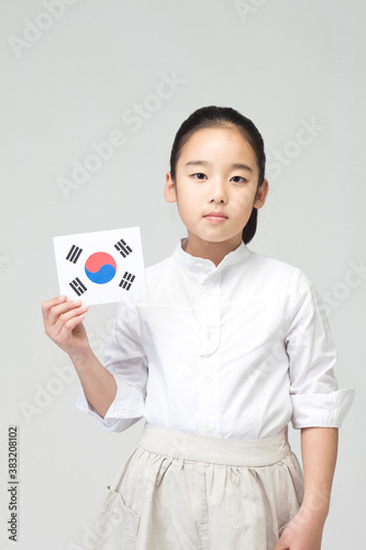 girl holding Korean flag, Taegeukgi