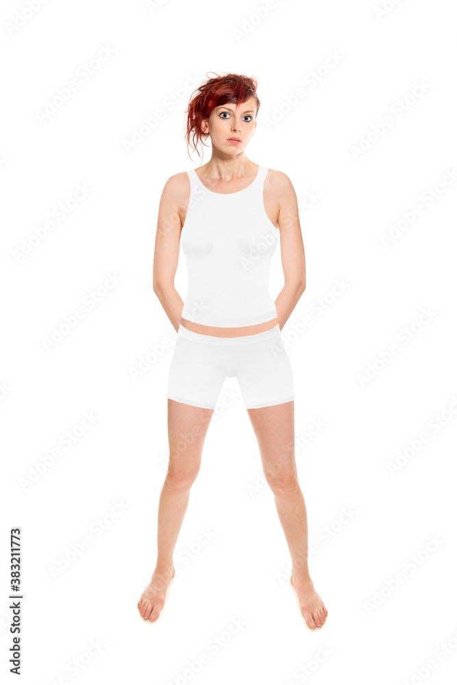 Full length portrait of an attractive woman wearing shorts and shirt, studio photo isolated in front of white background Full length portrait of an attractive woman wearing shorts and shirt, studio photo isolated in front of white background