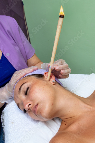 ear cleaning with a Hopi candle in the SPA.
