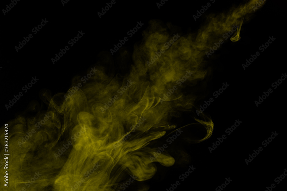 Yellow steam on a black background. Yellow steam on a black background.
