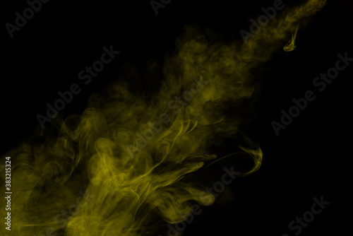 Yellow steam on a black background.