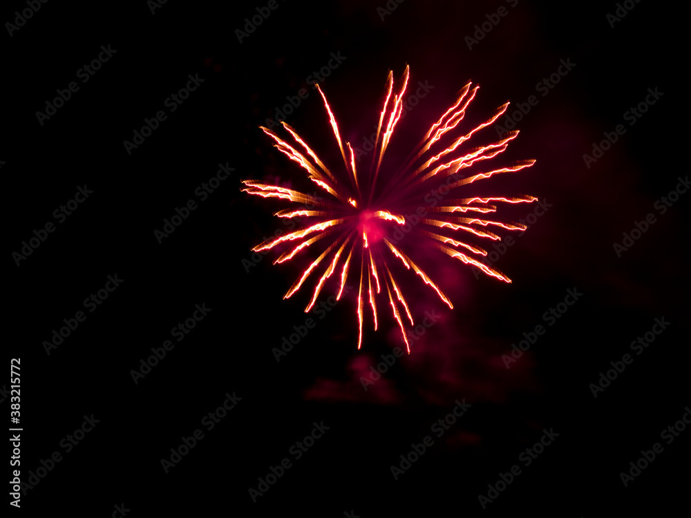 Burning sparklers on black background. Small fireworks giving off sparks of fire. Sparks explosion. Burning sparklers on black background. Small fireworks giving off sparks of fire. Sparks explosion.