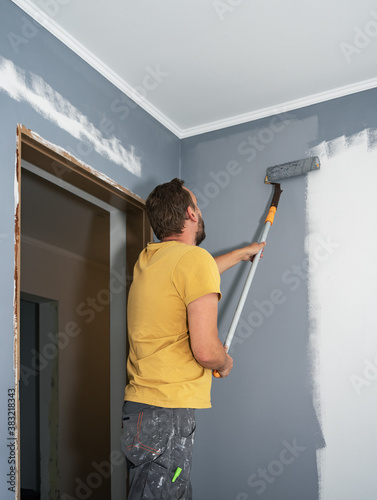 Painter restoring a wall.