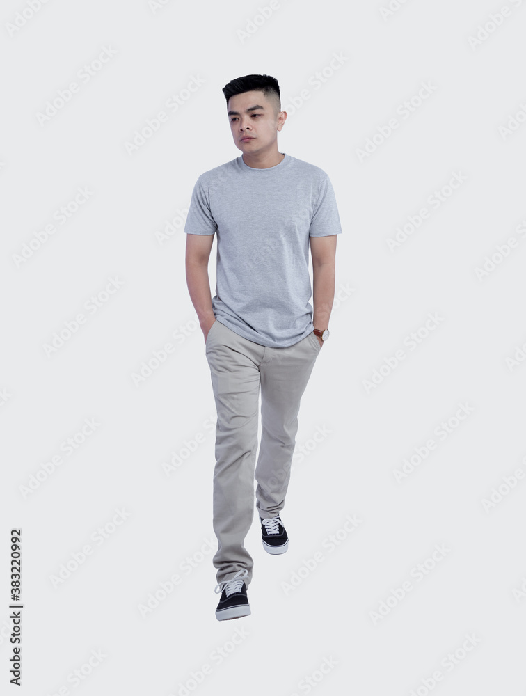 Young handsome man was posing wearing heather grey t-shirt short sleeve with mockup concept Young handsome man was posing wearing heather grey t-shirt short sleeve with mockup concept