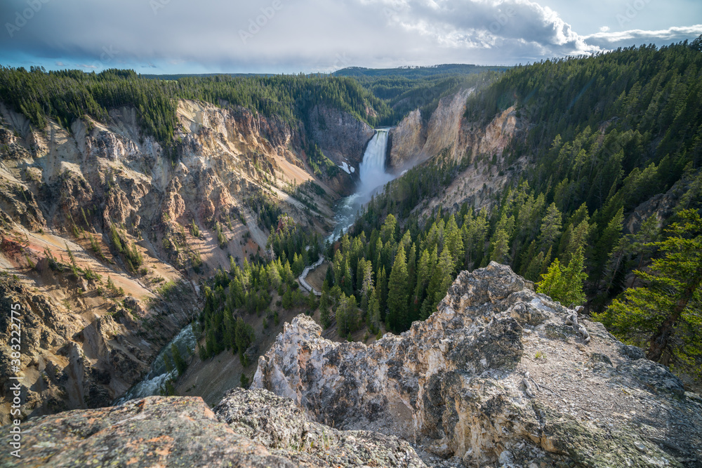 lower falls of the yellowstone national park at sunset, wyoming, usa