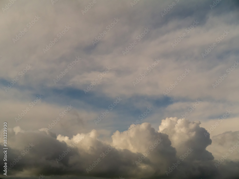 Beautiful white fluffy cloudy sky background,