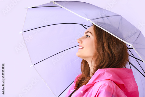 Beautiful young woman in ra...