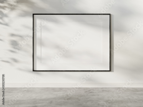 Fototapeta Naklejka Na Ścianę i Meble -  Black frame hanging in bright interior mockup. Template of a picture framed on a wall 3D rendering