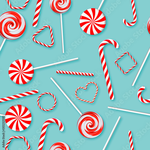 Colorful lollipops and candy canes on a blue background. Seamless texture. 3D rendering and 3D illustration.