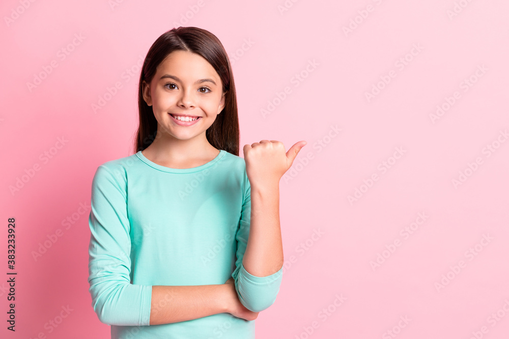 Photo of lovely pretty little hispanic lady long hairdo folded arms direct indicate thumb side empty space propose variant wear turquoise sweatshirt isolated pink color background Photo of lovely pretty little hispanic lady long hairdo folded arms direct indicate thumb side empty space propose variant wear turquoise sweatshirt isolated pink color background