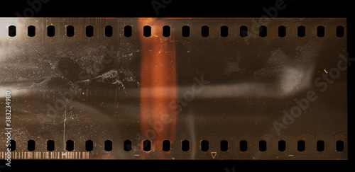 real scan of empty or blank 35mm negative film strip with dust and scratches, high res scan.
