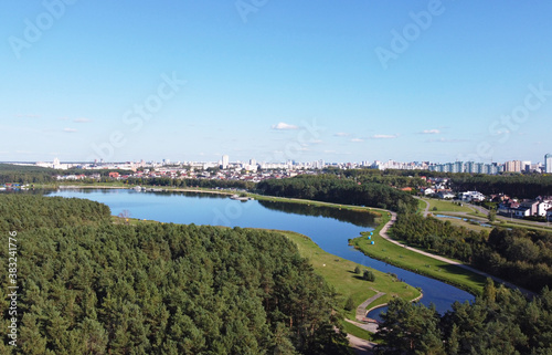 Top view of a beautiful city summer park with a river