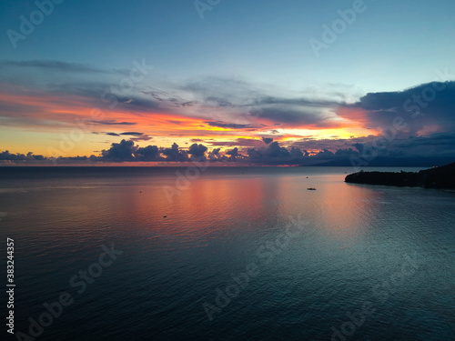 An aerial view of the beautiful sunset captured on top of a beach resort 