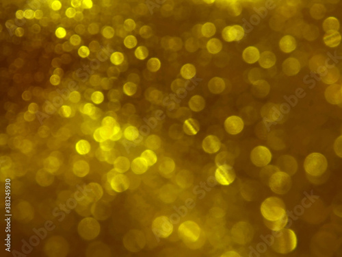 Shiny festive golden bokeh background