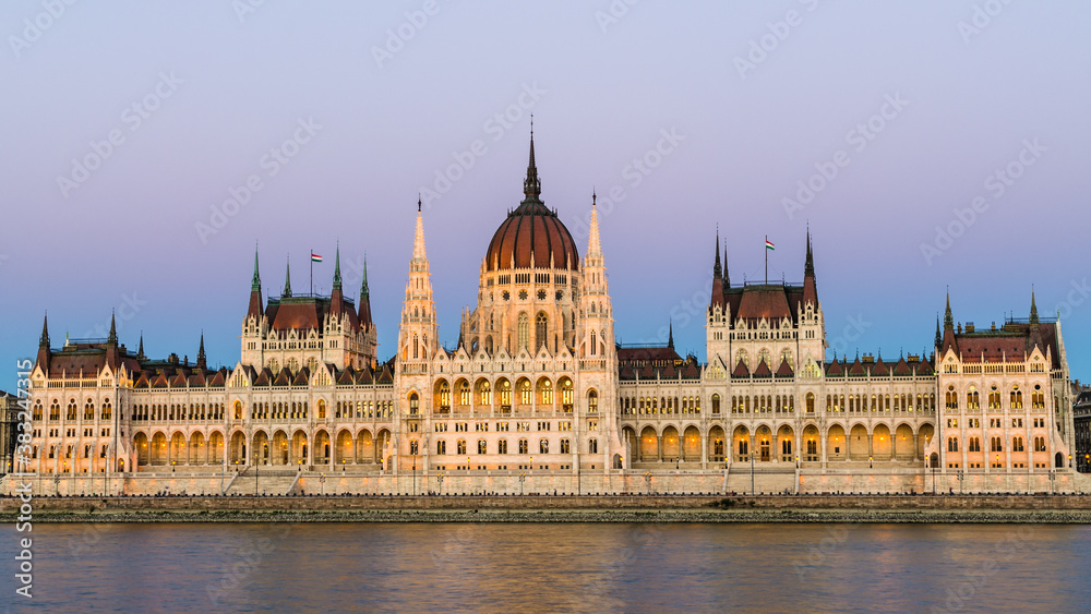 Hungarian Parliament Building at dusk from across the Danube river, Budapest, Hungary