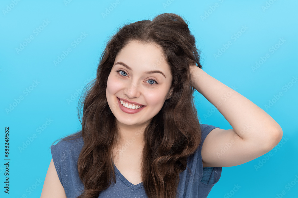 Beautiful young women on blue background Beautiful young women on blue background